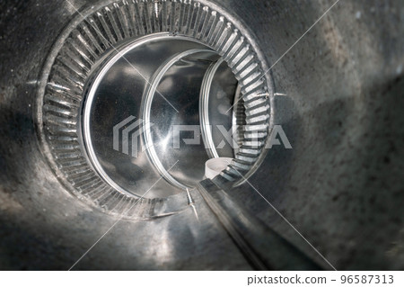 Interior view of residential HVAC galvanized metal duct piping 96587313