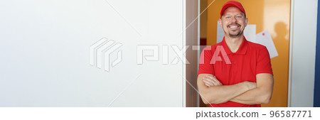 Happy man courier in red shirt and cap uniform, delivery worker 96587771