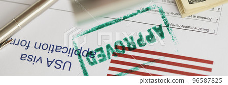 Green approved stamp on document, visa application form, hand stamping approved on sheet Green approved stamp on document, visa application form, hand stamping approved on sheet 96587825