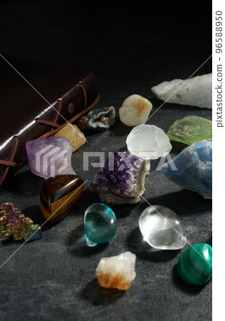 various gem stones on dark background 96588950