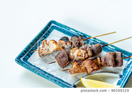 Charcoal-grilled Pork Gatsu Skewers 96589329