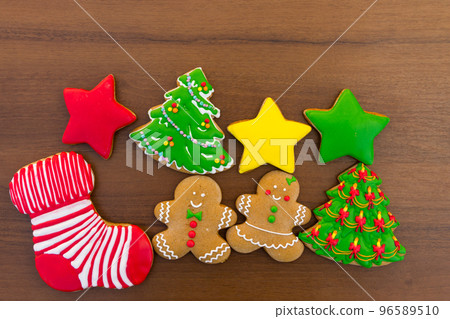 Festive tasty Christmas cookies on wooden table. Top view 96589510