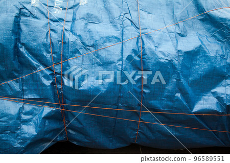 Blue crumpled synthetic fabric. 96589551