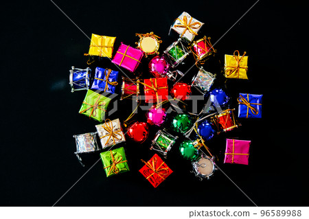 Christmas black background. Little gift boxes. Top view. Christmas black background. Little gift boxes. Top view. 96589988