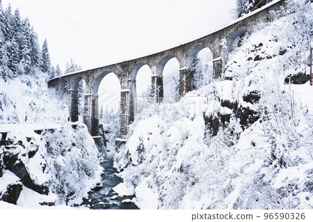 Mountain landscape with Sainte Marie bridge covered with snow. 96590326