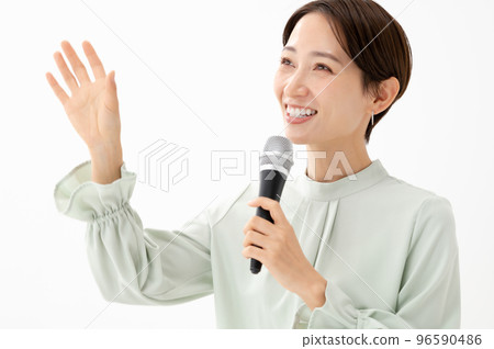 Woman holding a microphone White background 96590486