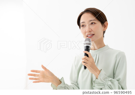 Woman holding a microphone White background 96590495