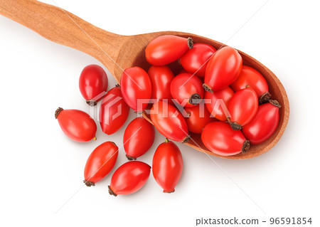 Rose hip in wooden spoon isolated on a white background with full depth of field. Top view. Flat lay. Rose hip in wooden spoon isolated on a white background with full depth of field. Top view. Flat lay. 96591854