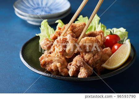 Fried chicken served on a plate Fried chicken served on a plate 96593790