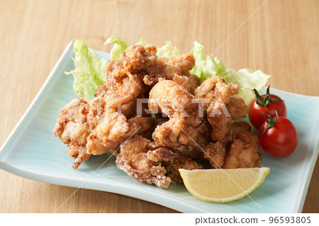 Fried chicken served on a plate 96593805