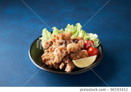 Fried chicken served on a plate 96593812