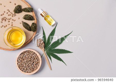 Distillation concept of CBD oil feature with hemp seeds on the white background. 96594640