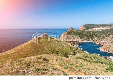 Scenic panoramic view of Balaclava bay with yachts from the ruines of Genoese fortress Chembalo. Balaklava, Sevastopol, Crimea. Inspirational travel landscape. Aerial photo. Copy space. Scenic panoramic view of Balaclava bay with yachts from the ruines of Genoese fortress Chembalo. Balaklava, Sevastopol, Crimea. Inspirational travel landscape. Aerial photo. Copy space. 96597364