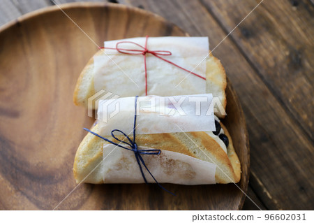 Fruit omelette cake wrapped in glassine paper 96602031