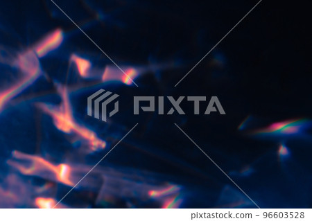 colorful warm pink rainbow light leaks on black background 96603528