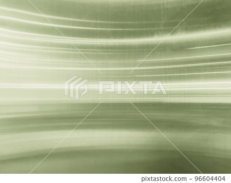 Background image of a hairline finish metal plate with light yellow-green light lines Background image of a hairline finish metal plate with light yellow-green light lines 96604404