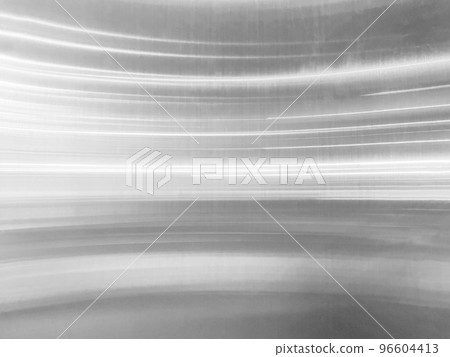 Background image of a hairline finish metal plate with thin silver lines of light 96604413