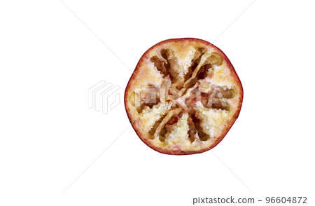 pitted pomegranate halves on a white background,isolated fruit pitted pomegranate halves on a white background,isolated fruit 96604872