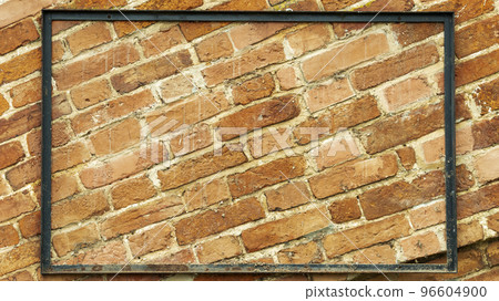 iron plate on the background of a brick wall, template 96604900