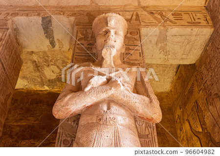 Low angle view of an statue in an egyptian temple Low angle view of an statue in an egyptian temple 96604982