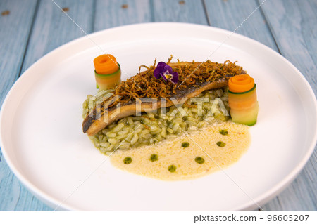 Recipe for fried fillet of sea bass with herb risotto, white wine sauce, fresch creme, roll of 96605207