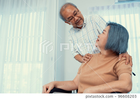 A contented senior couple and their in-home nurse. A contented senior couple and their in-home nurse. 96608203