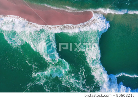 Spectacular top view from drone photo of beautiful pink beach. 96608215