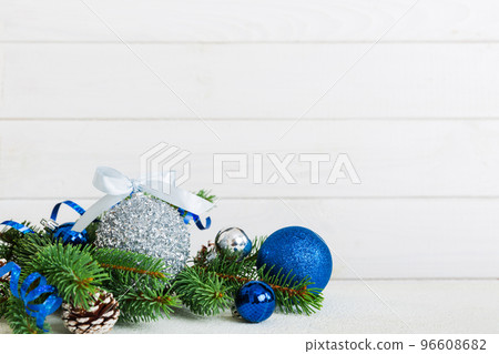 New Year Christmas tree toy, branches of a christmas tree, New Year decorations on a colored background 96608682