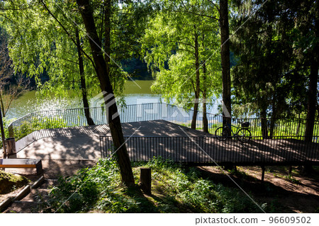 Observation deck near the pond, modern park area 96609502