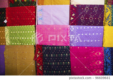Bangladeshi Women,s Traditional Colorful Jamdani saree hanging in the retail Showrooms. Colorful Jamdani Saree Texture Background Bangladeshi Women,s Traditional Colorful Jamdani saree hanging in the retail Showrooms. Colorful Jamdani Saree Texture Background 96609681
