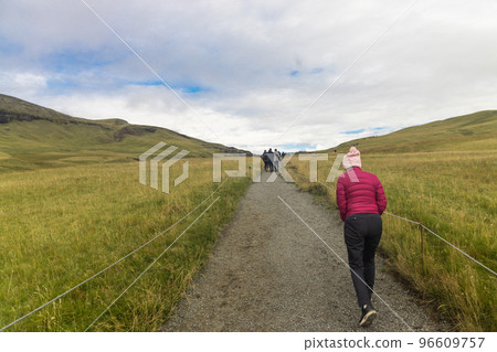 Hikers trekking up to Fjadrargljufur canyon in South Iceland to enjoy scenic and dramatic landscape Hikers trekking up to Fjadrargljufur canyon in South Iceland to enjoy scenic and dramatic landscape 96609757