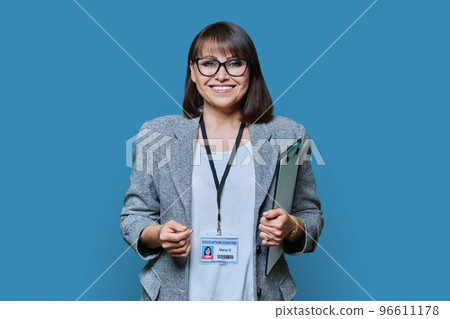 Confident woman with education center card on blue background 96611178
