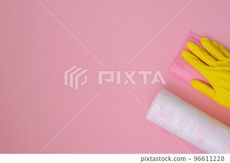 Cleaning products on pink background. Microfiber, sponges and brush. Cleaning accessories. Top view. Copy space. 96611228