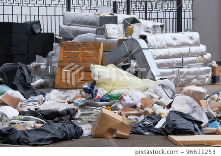 Construction garbage, cardboard, polyethylene after building repair. Removal of debris. Bunch of trash. 96611253