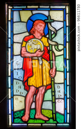 Stained glass window of Saint John the Baptist at Red Castle - Wales Stained glass window of Saint John the Baptist at Red Castle - Wales 96611780