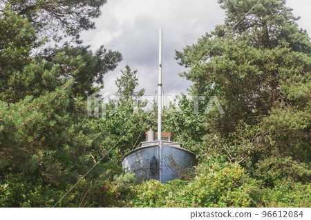 Old abandoned fishing ship in the forest Old abandoned fishing ship in the forest 96612084