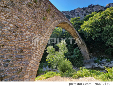 Portaikos River single arch Bridge at Pyli, Greece 96612149