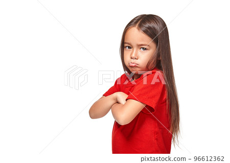 Girl in red t-shirt serious face offended white background Girl in red t-shirt serious face offended white background 96612362