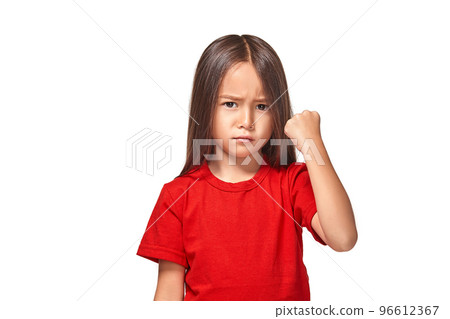 Beautiful girl in red t-shirt shakes her fist Beautiful girl in red t-shirt shakes her fist 96612367