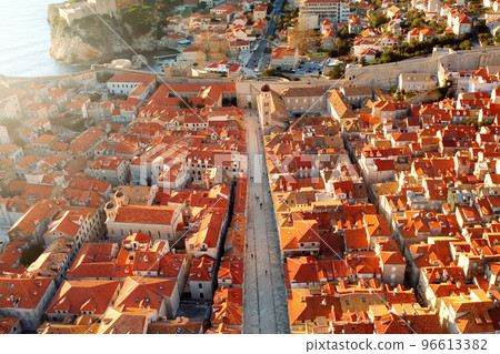 Amazing panoramic sunset drone view of old city of Dubrovnik, Croatia. View of the historical center and view of the residential part of the city Amazing panoramic sunset drone view of old city of Dubrovnik, Croatia. View of the historical center and view of the residential part of the city 96613382