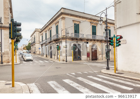 View of the old town of Martina Franca with a beautiful houses painted in white. 96613917