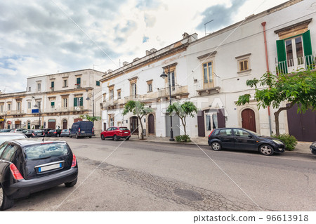 View of the old town of Martina Franca with a beautiful houses painted in white. 96613918