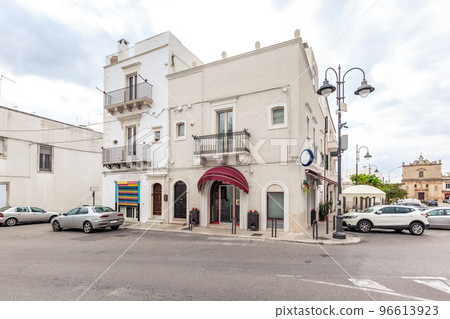 View of the old town of Martina Franca with a beautiful houses painted in white. 96613923
