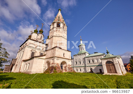 Old orthodox church at village. Summer view with floral meadow. 96613987