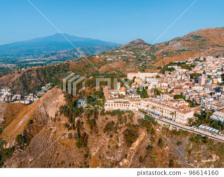 Beautiful aerial view of the Taormina town in Sicily, Italy. One of the most beautiful towns in Italy. Beautiful aerial view of the Taormina town in Sicily, Italy. One of the most beautiful towns in Italy. 96614160