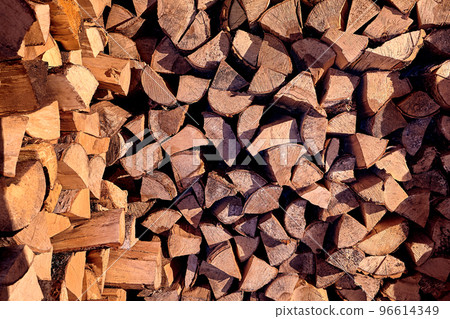 Wooden logs, beams, firewood, frame. A lot of wood. Wooden log wooden background. Logging 96614349