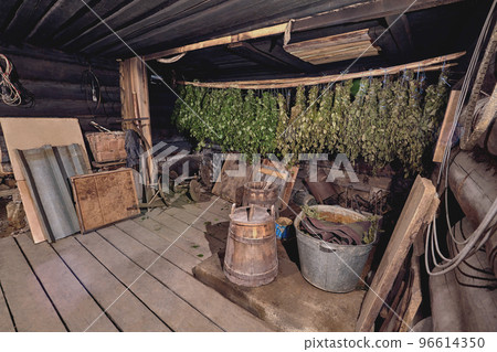 Dried herbs and branches on wooden background of ancient bathhouse Dried herbs and branches on wooden background of ancient bathhouse 96614350