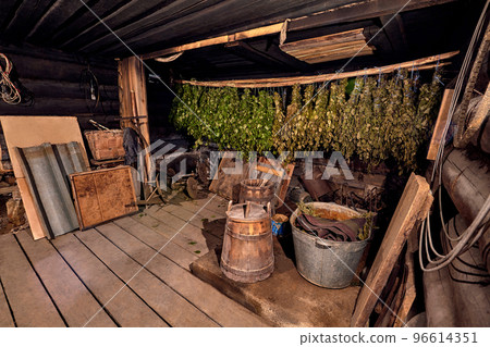 Dried herbs and branches on wooden background of ancient bathhouse Dried herbs and branches on wooden background of ancient bathhouse 96614351