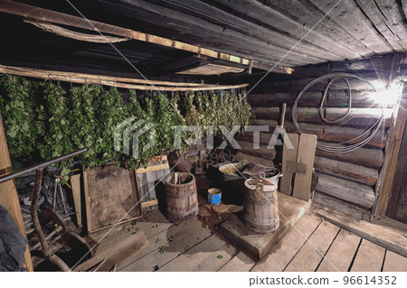 Dried herbs and branches on wooden background of ancient bathhouse Dried herbs and branches on wooden background of ancient bathhouse 96614352