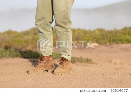 Close-up of dusty female hiking boots 96614677